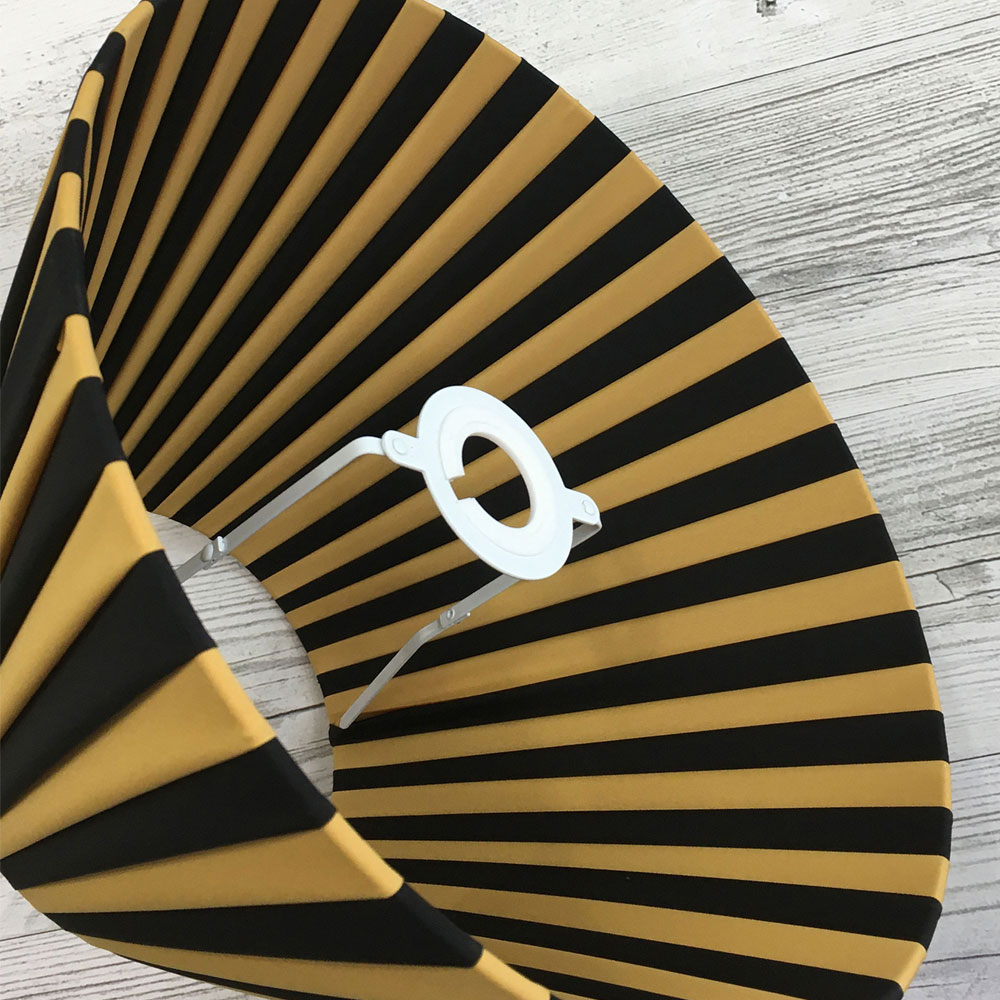 Black and Gold Pleated Lightshade shown on its side