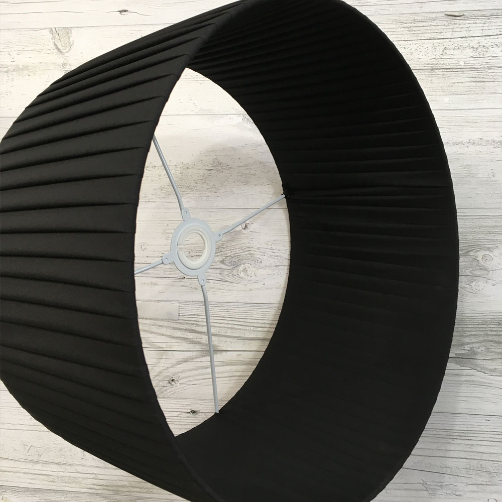 Black Pleated Drum Lightshade shown on its side