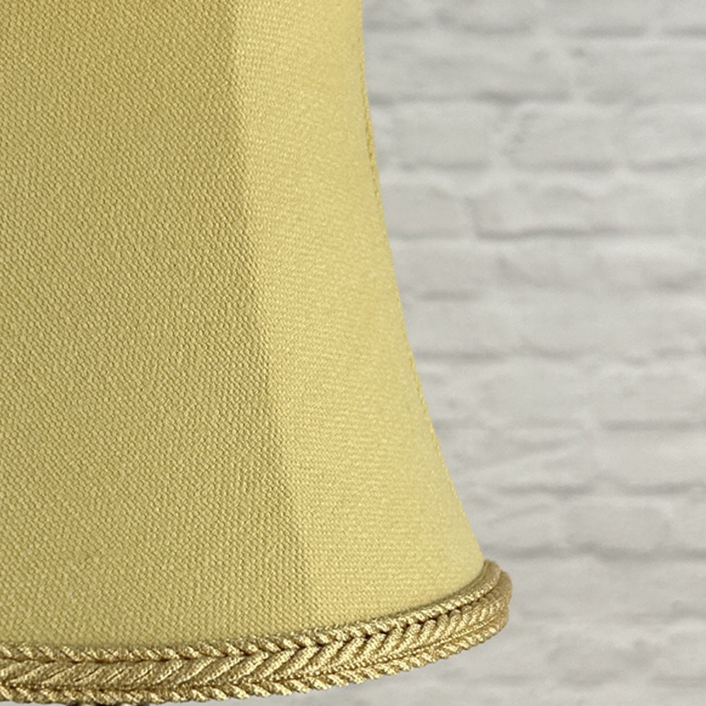 Close-up of soft gold brushed cotton bowed chandelier shade with rope trim