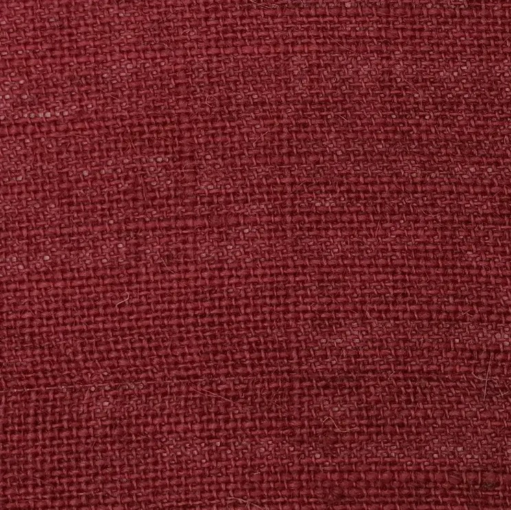 Red hessian fabric lampshade close up texture