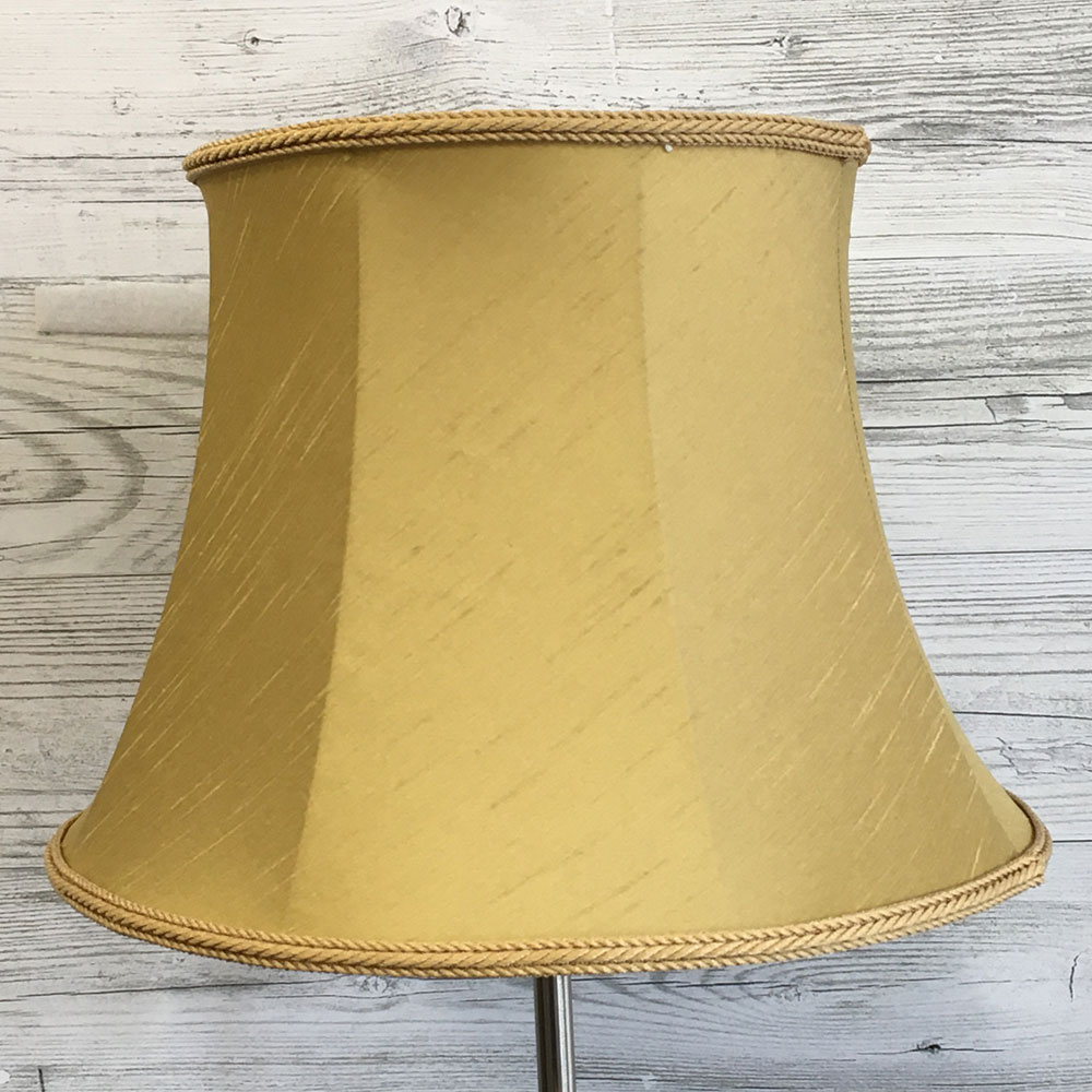 Gold Faux Silk Drum lampshade on a table lamp switched off