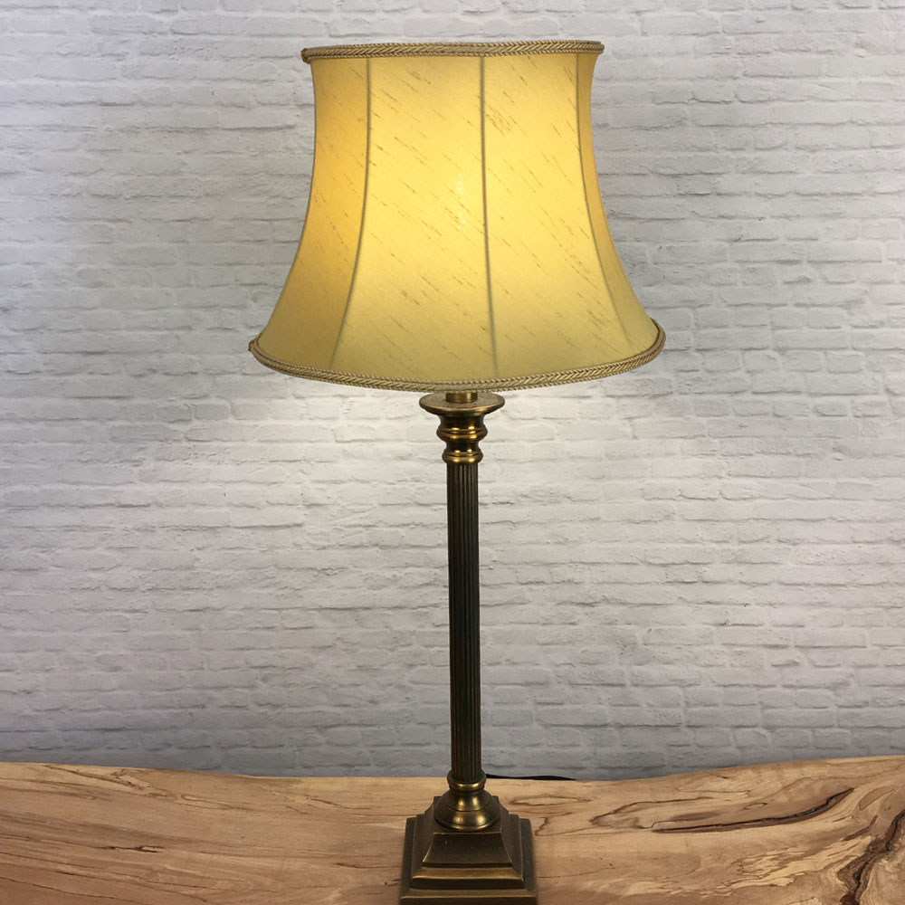 Gold Faux Silk Drum lampshade on a table lamp