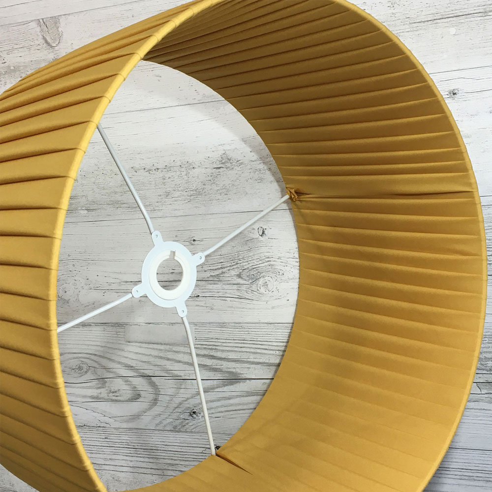 Gold Pleated Drum Lightshade shown on its side