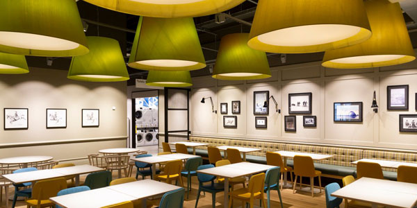 A John Lewis restaurant full of our Green XL pendant shades