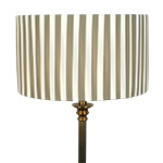 A pleated drum lampshade with cream and taupe stripes