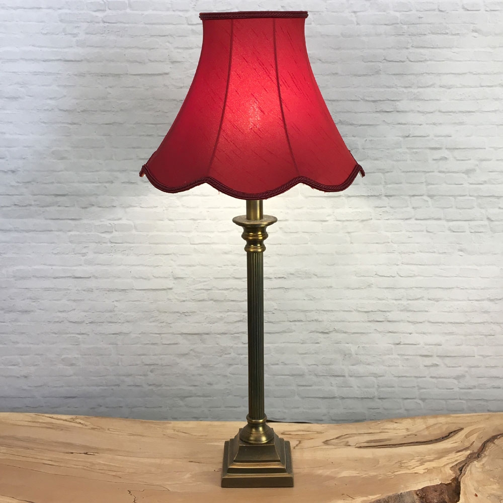 Complete Image of a Retro Burgundy Scalloped Lampshade on a Table lamp switched on