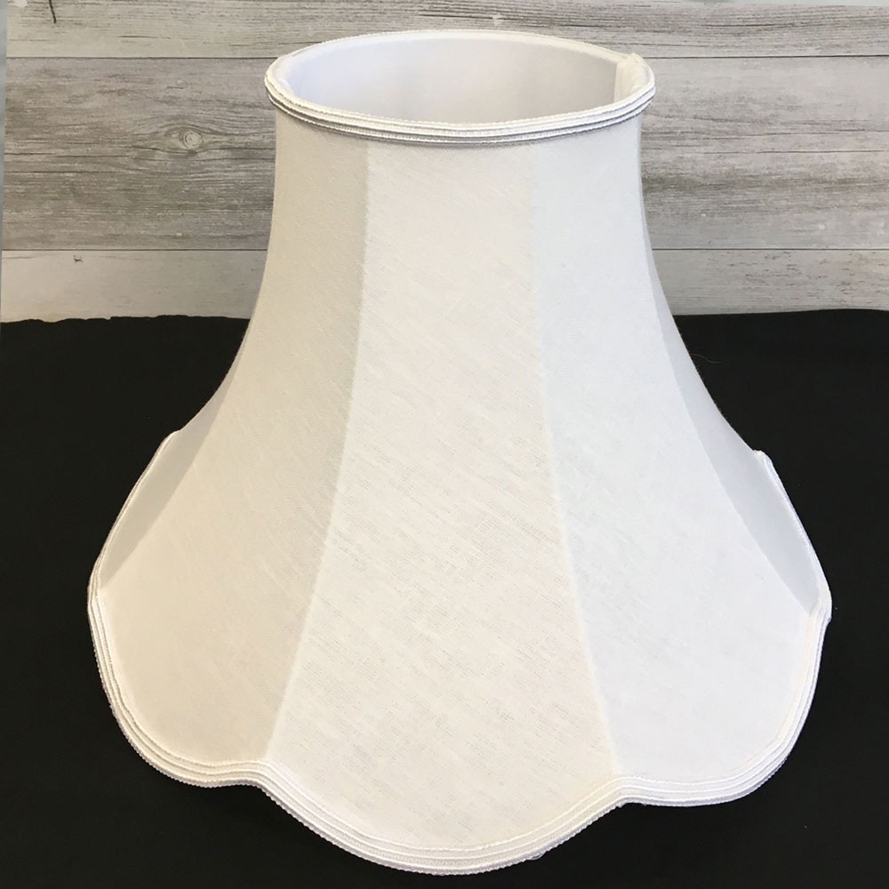 white scalloped retro lampshade in table