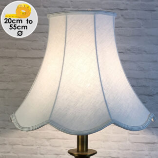 white scalloped lampshade switched on
