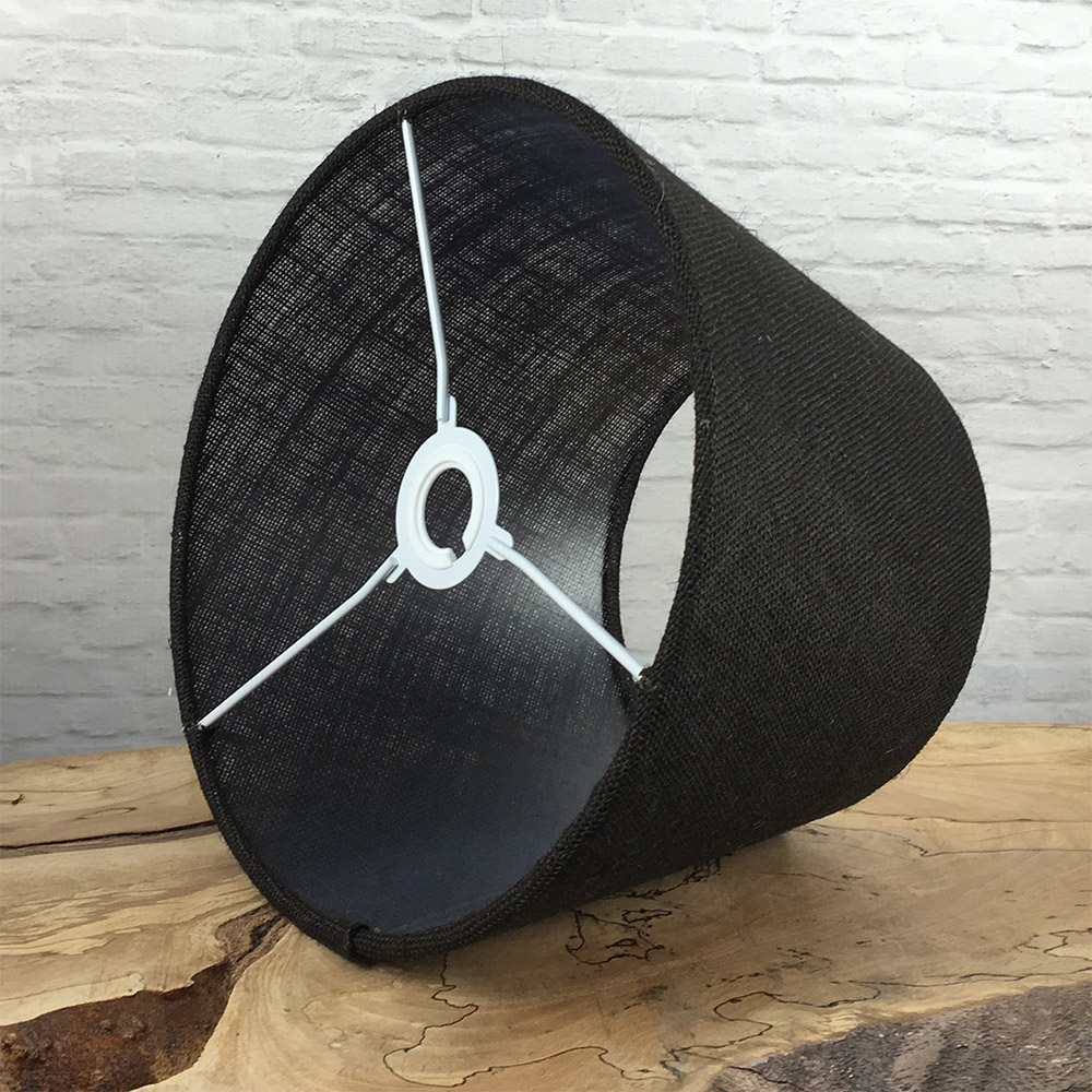 Interior view of black hessian tapered drum lampshade showing frame and lining