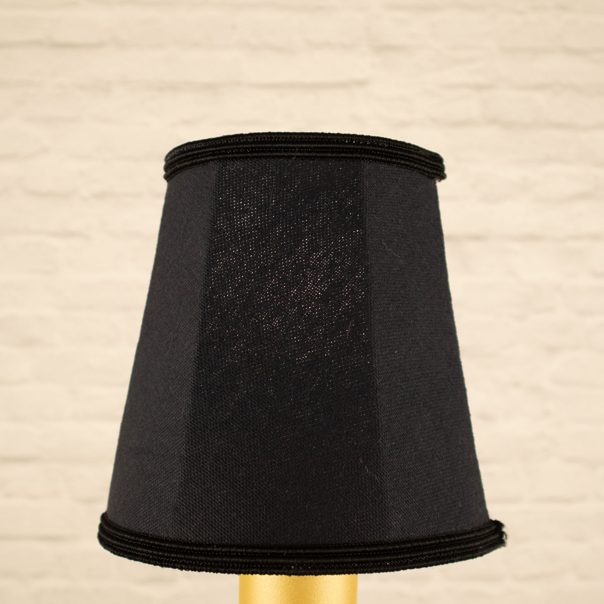 Lit black empire brushed cotton candle shade with matching soutache trim