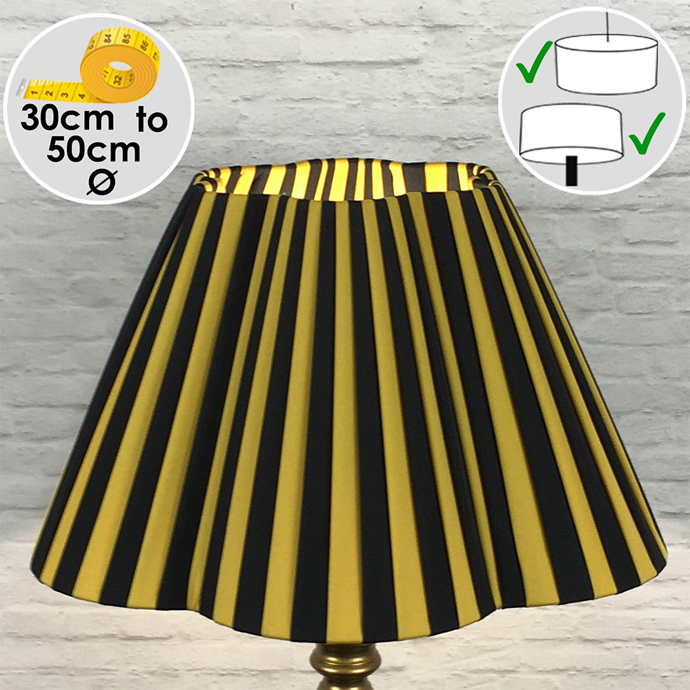 Front view of black and gold striped daisy pleated lampshade with scalloped edge