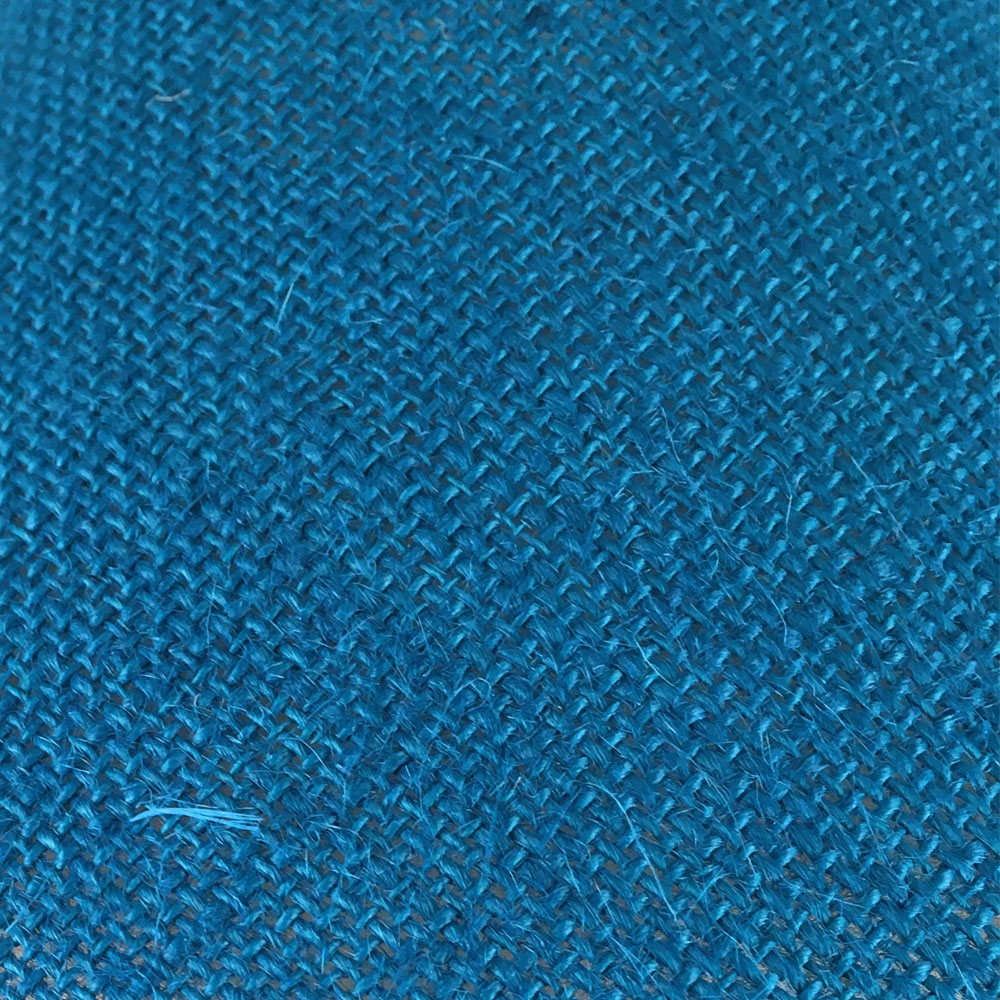 Close-up of blue hessian fabric lampshade texture