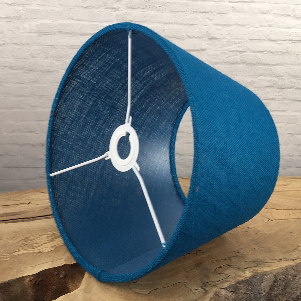 Inside view of blue hessian lampshade with fitting