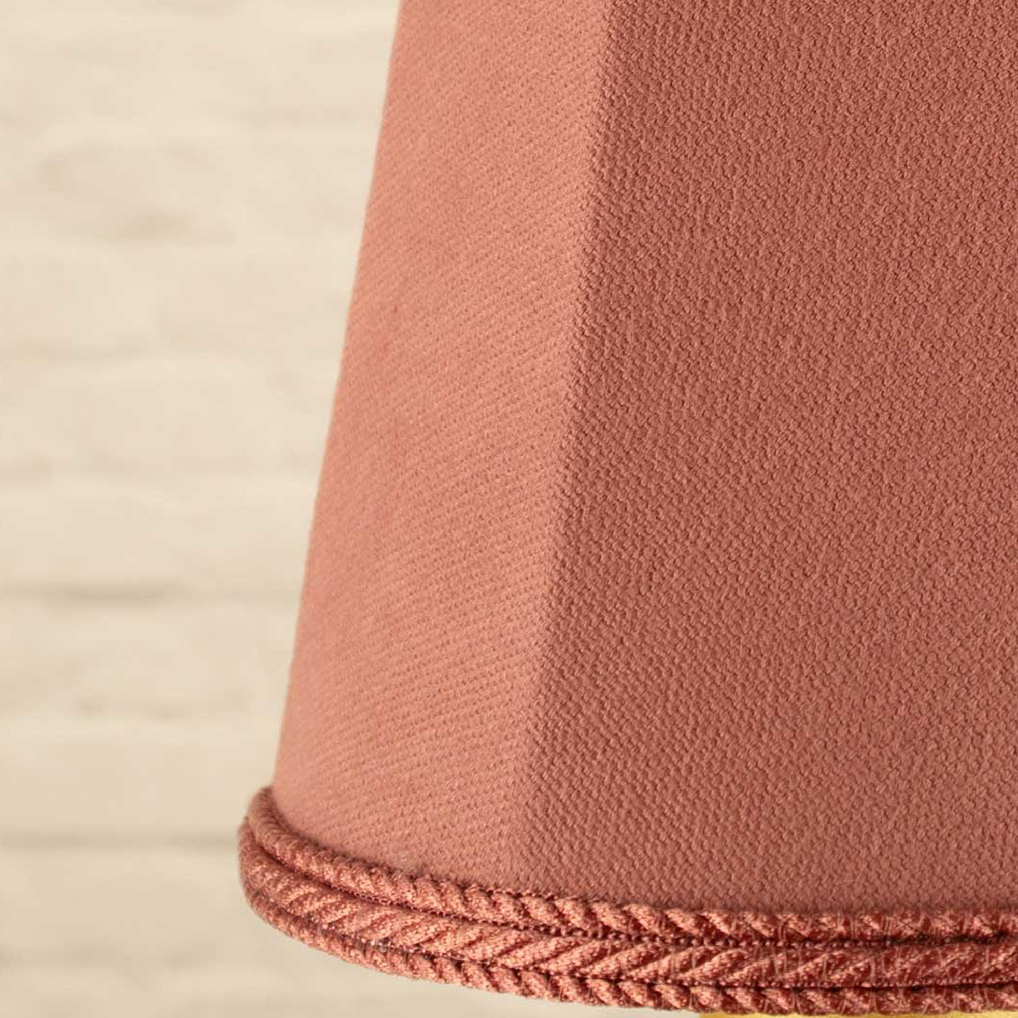 Close-up of bon bon brushed cotton fabric and matching rope trim on empire candle shade