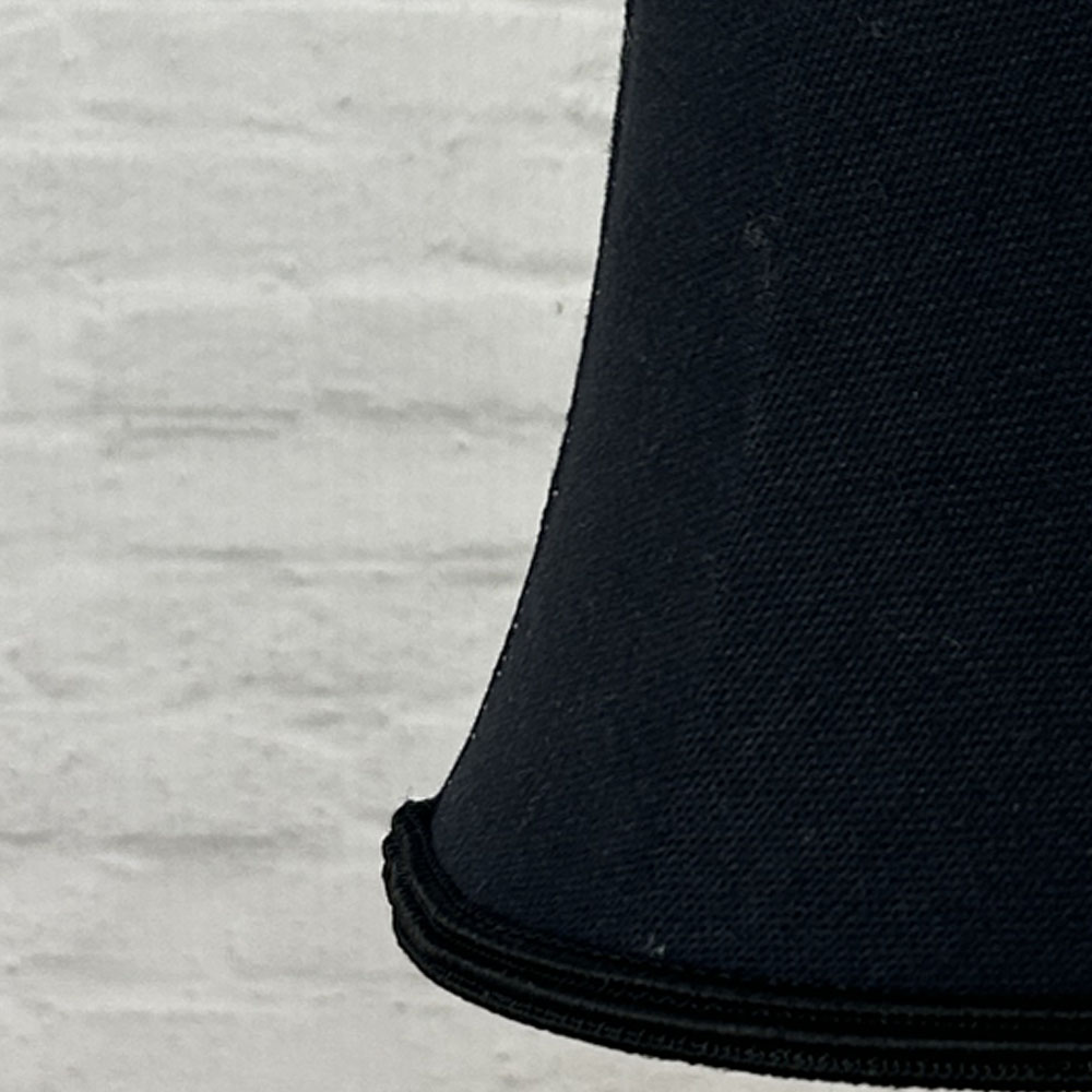 Close-up of black brushed cotton bowed chandelier shade with matching black soutache trim