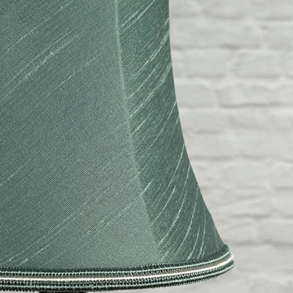 Close-up of green faux silk bowed chandelier shade