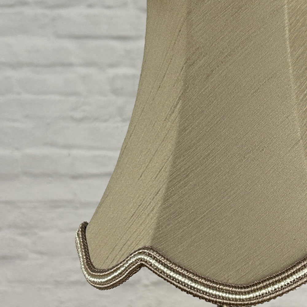 Close-up of fawn faux silk scalloped chandelier shade with oyster soutache trim