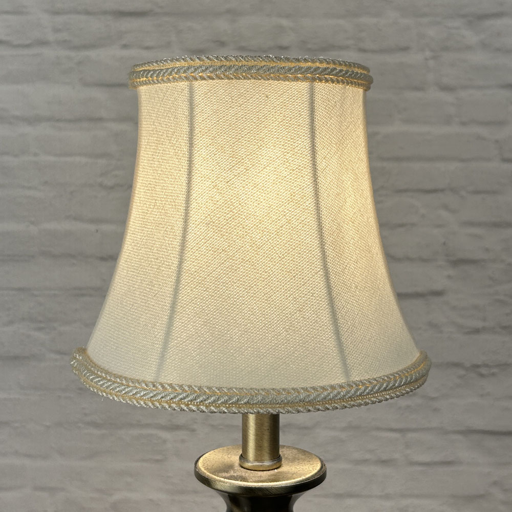 Cream bowed chandelier shade in brushed cotton lit showing warm tone and rope trim