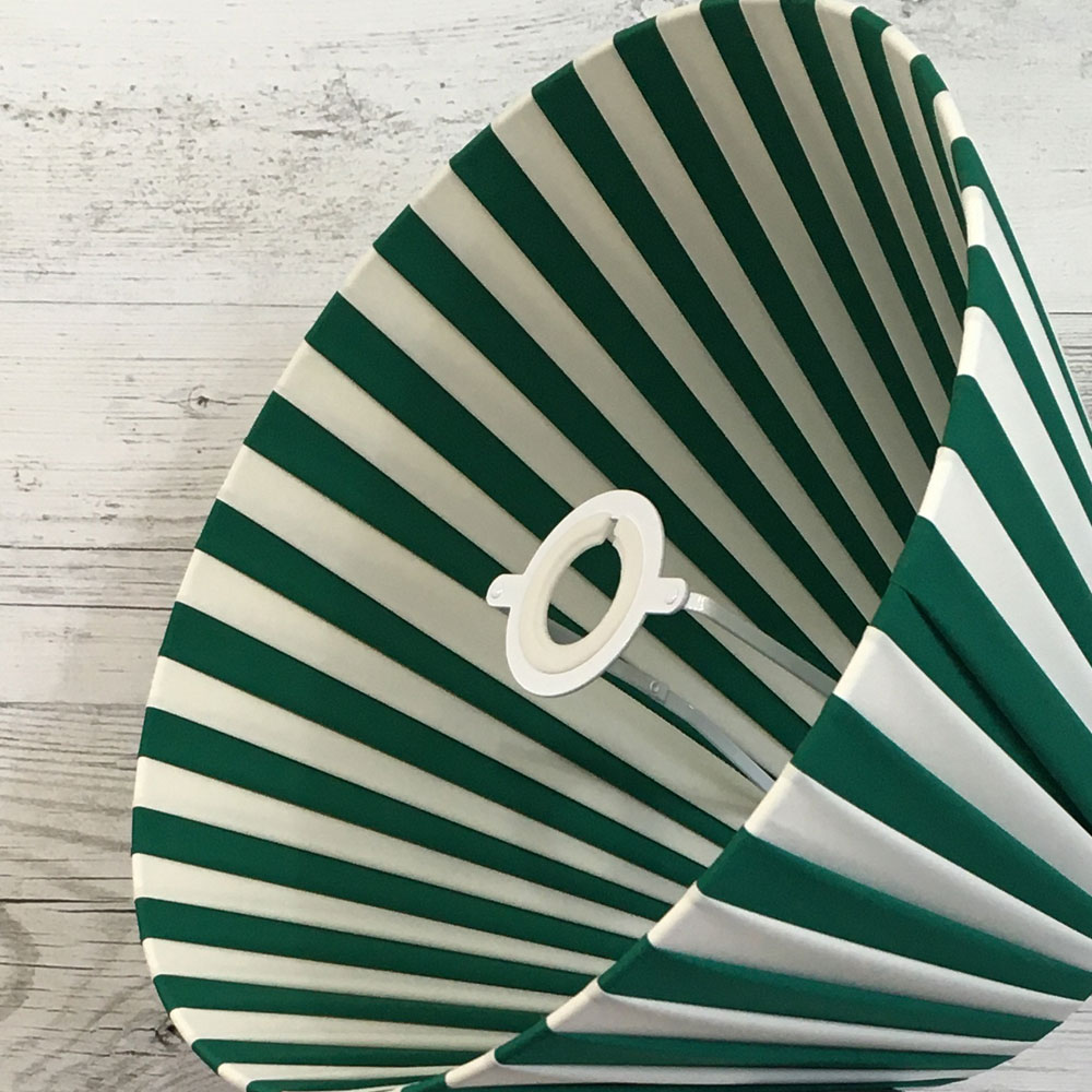 Pleated Lightshade shown on its side in Green and White stripe