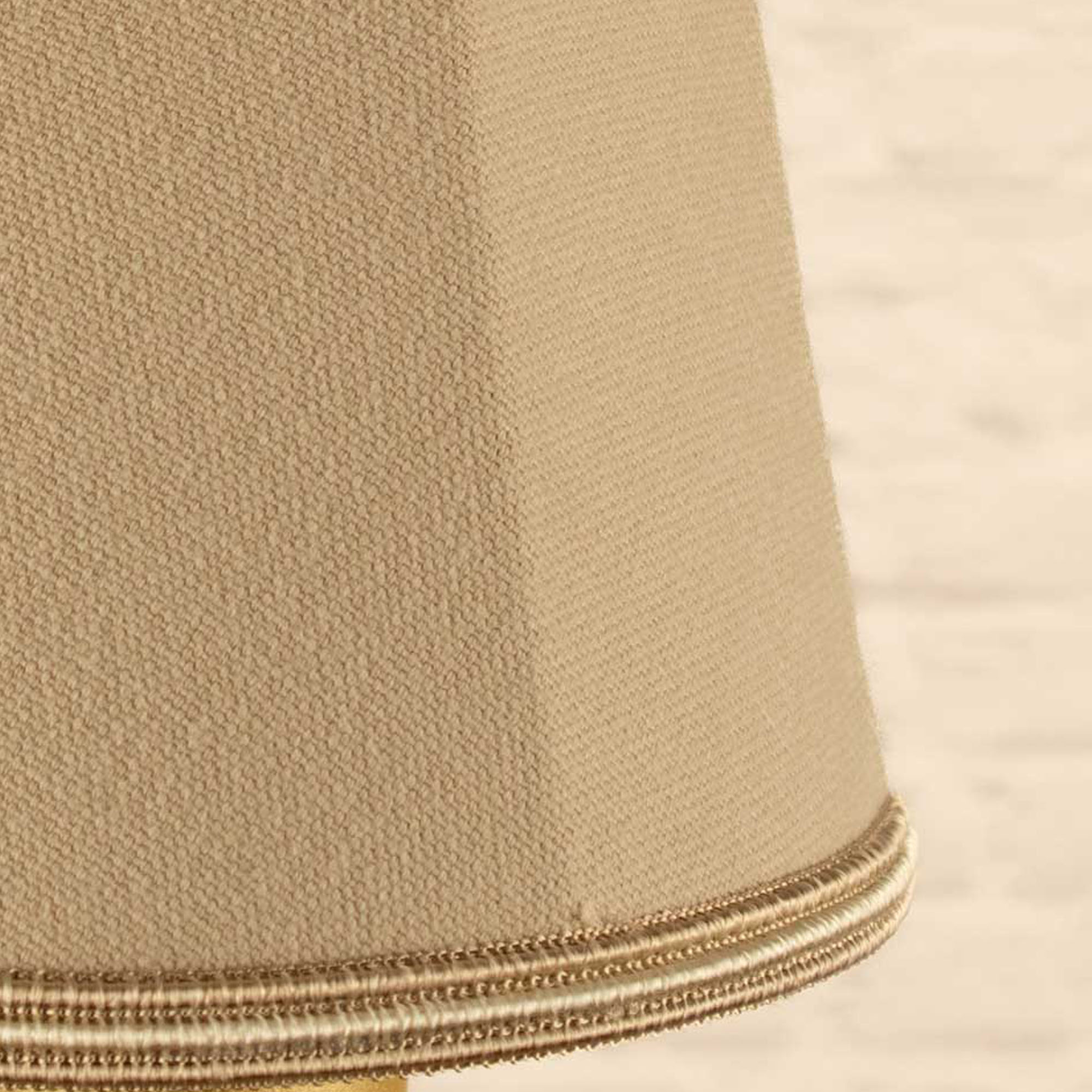 Close-up of fawn brushed cotton fabric and fawn and oyster soutache trim on empire candle shade