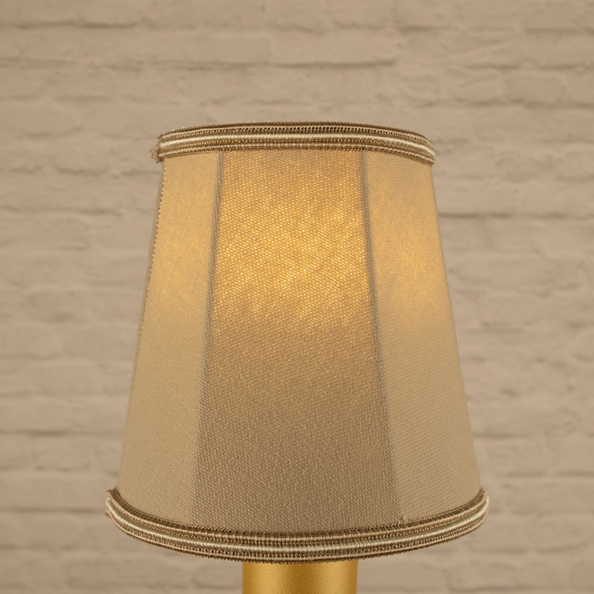 Lit fawn empire brushed cotton candle shade with fawn and oyster soutache trim