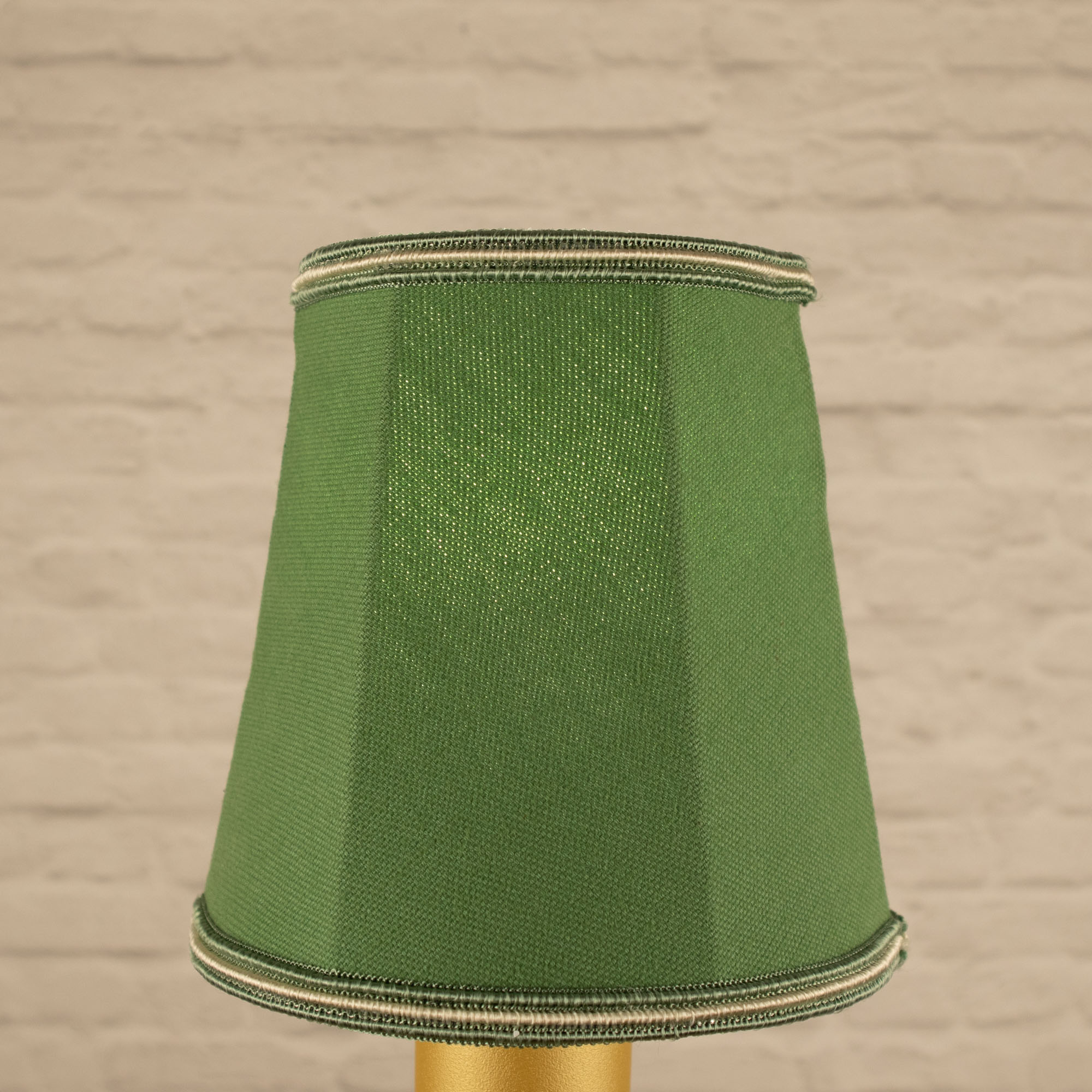 Lit green empire brushed cotton candle shade with green and fawn soutache trim