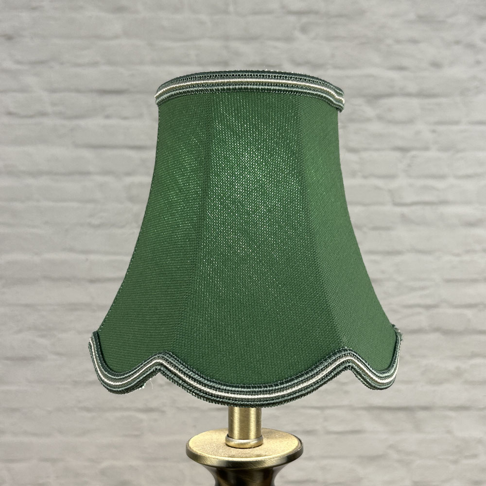 Green scalloped chandelier shade in brushed cotton lit showing rich tone and oyster soutache trim