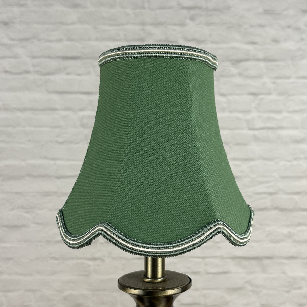 Soft gold scalloped chandelier shade in brushed cotton lit showing warm tone and rope trim