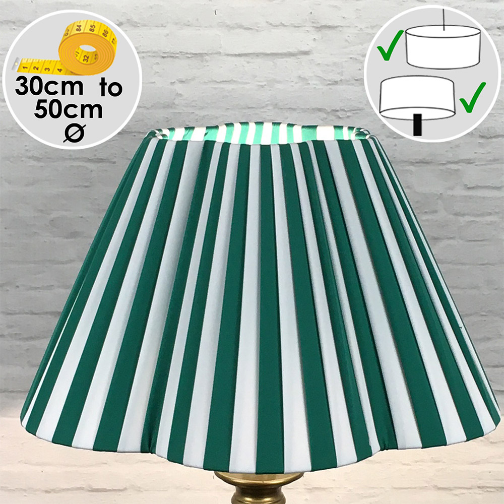 Front view of a green and white striped daisy pleated lampshade with scalloped edge