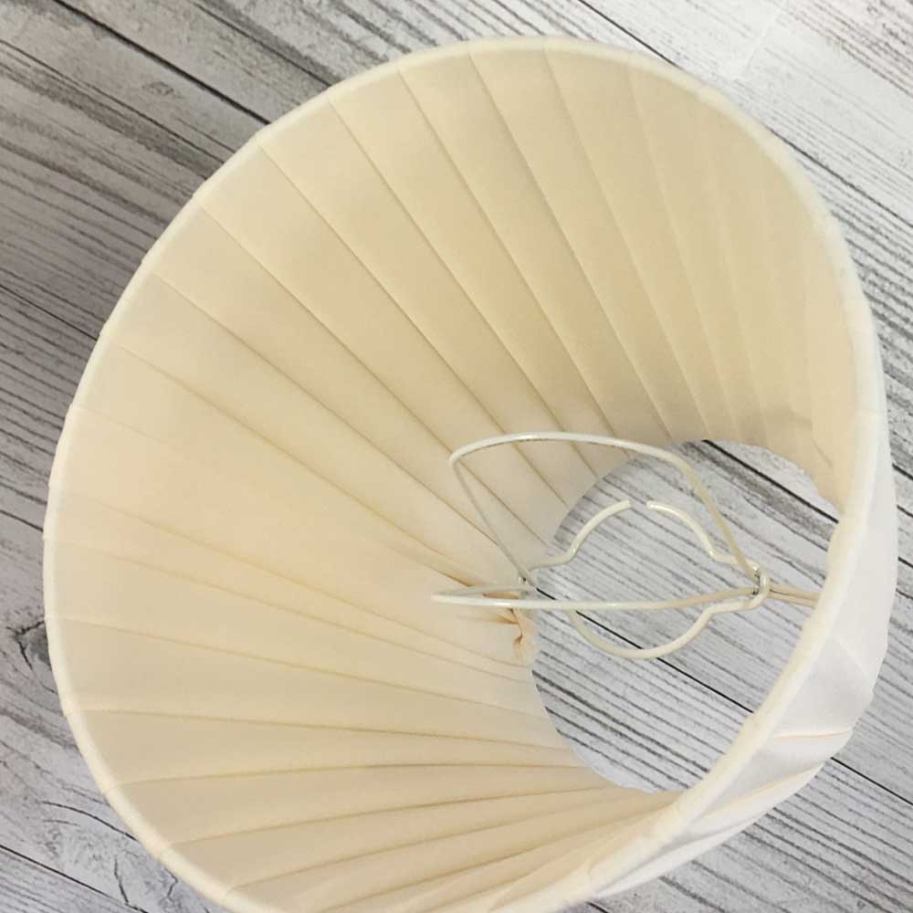Interior view of cream ribbon empire candle lampshade showing clip-on fitting