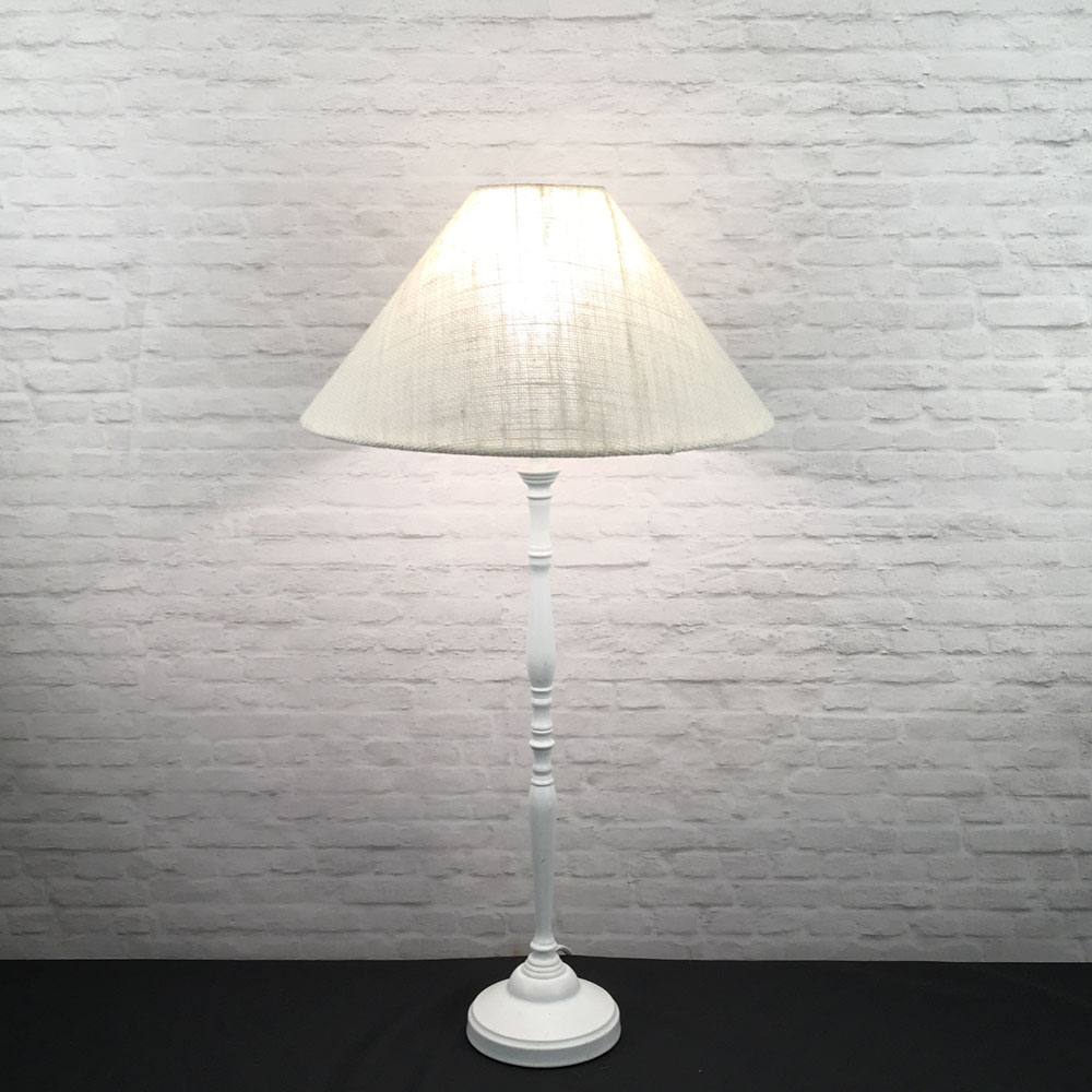 Off-white hessian coolie table lamp illuminated