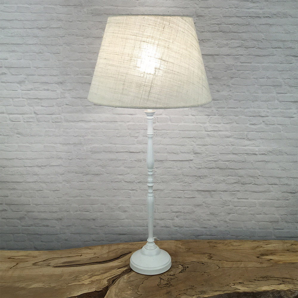Off white hessian lampshade on table lamp with soft light