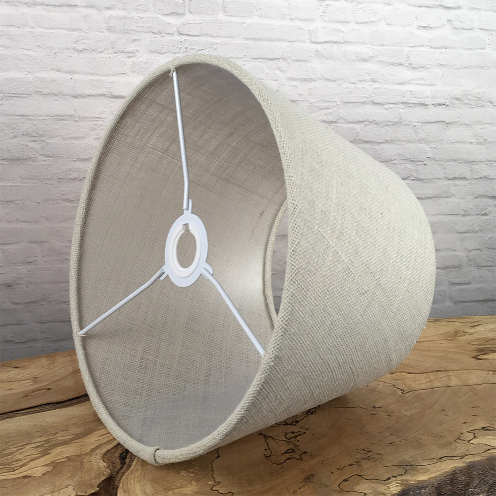 Interior of off white hessian tapered drum lampshade with spider fitting