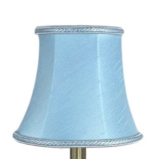 Pale blue faux silk bowed chandelier shade with rope trim and curved shape