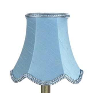 Scalloped faux silk lampshade in pale blue with matching rope trim