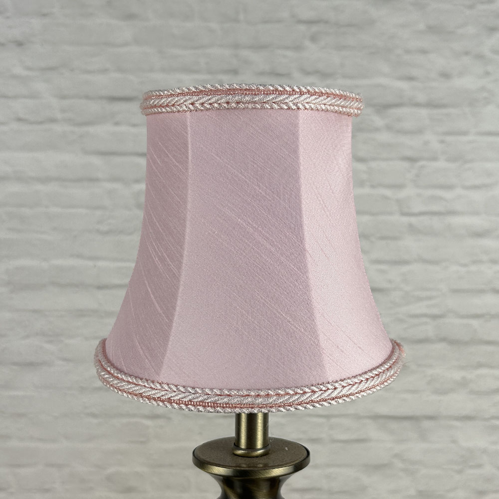 Pink faux silk bowed chandelier shade unlit