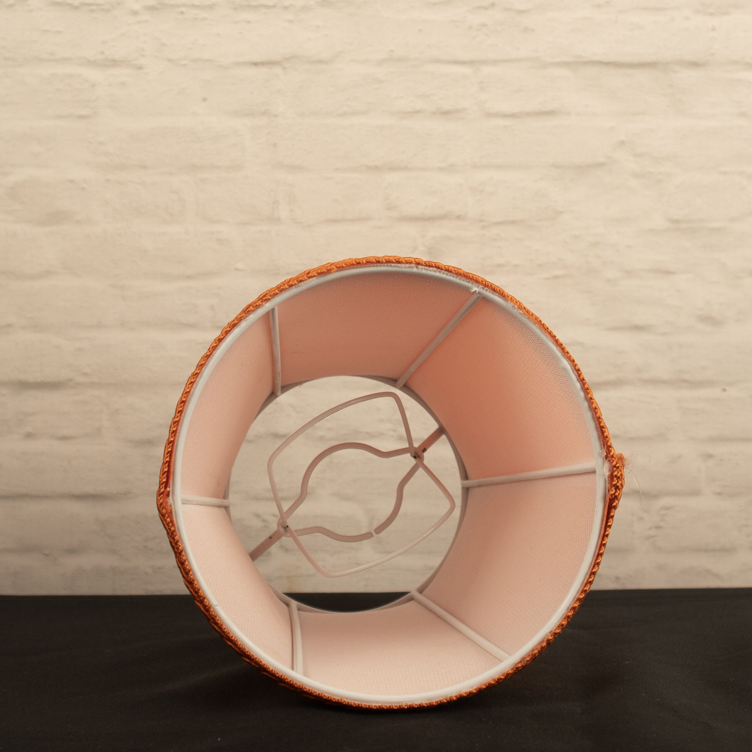 Interior view of empire candle shade showing clip-on fitting attachmen