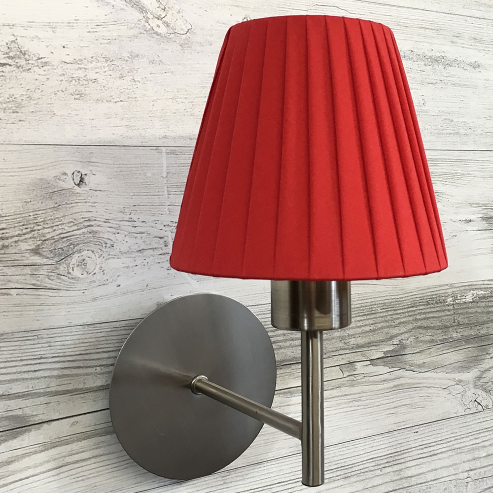 Red ribbon empire candle lampshade on wall light
