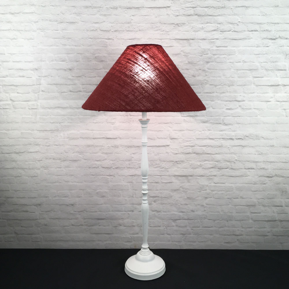 Red burlap coolie table lamp illuminated