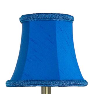 Bowed faux silk chandelier shade in royal blue with matching plait trim