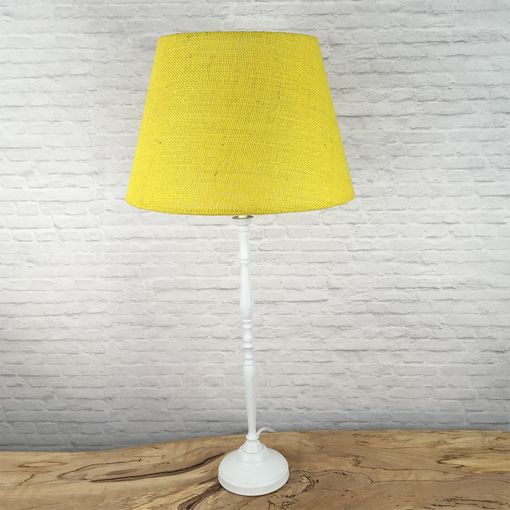 Yellow hessian lampshade on table lamp